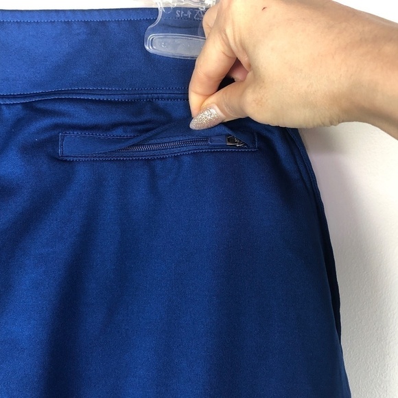 Lady Hagen golf running skirt navy neon orange shorts underneath - Picture 5 of 9